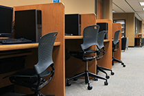 computer workstations with chairs