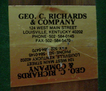 Maker's sticker on bottom of trophy.
